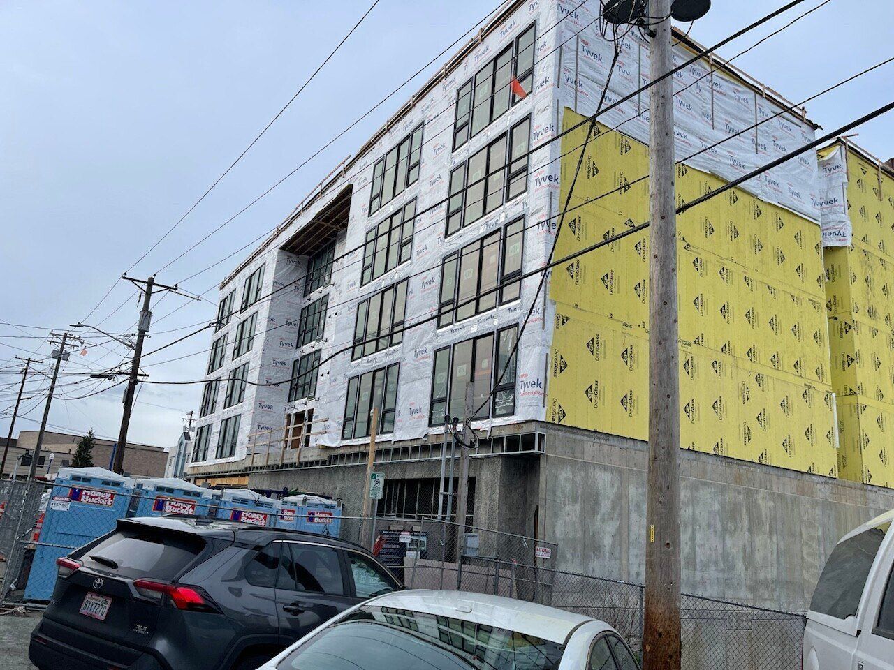 23 Broadway apartments in Tacoma wrapped in weather barrier before siding