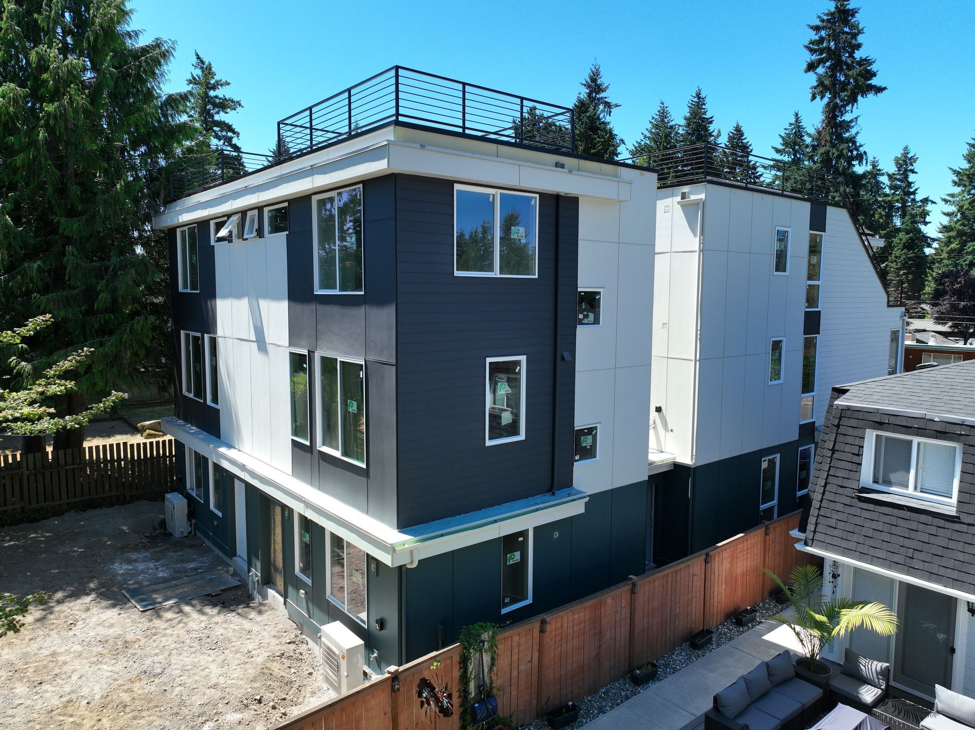 An aerial view of a building with a balcony on top of it