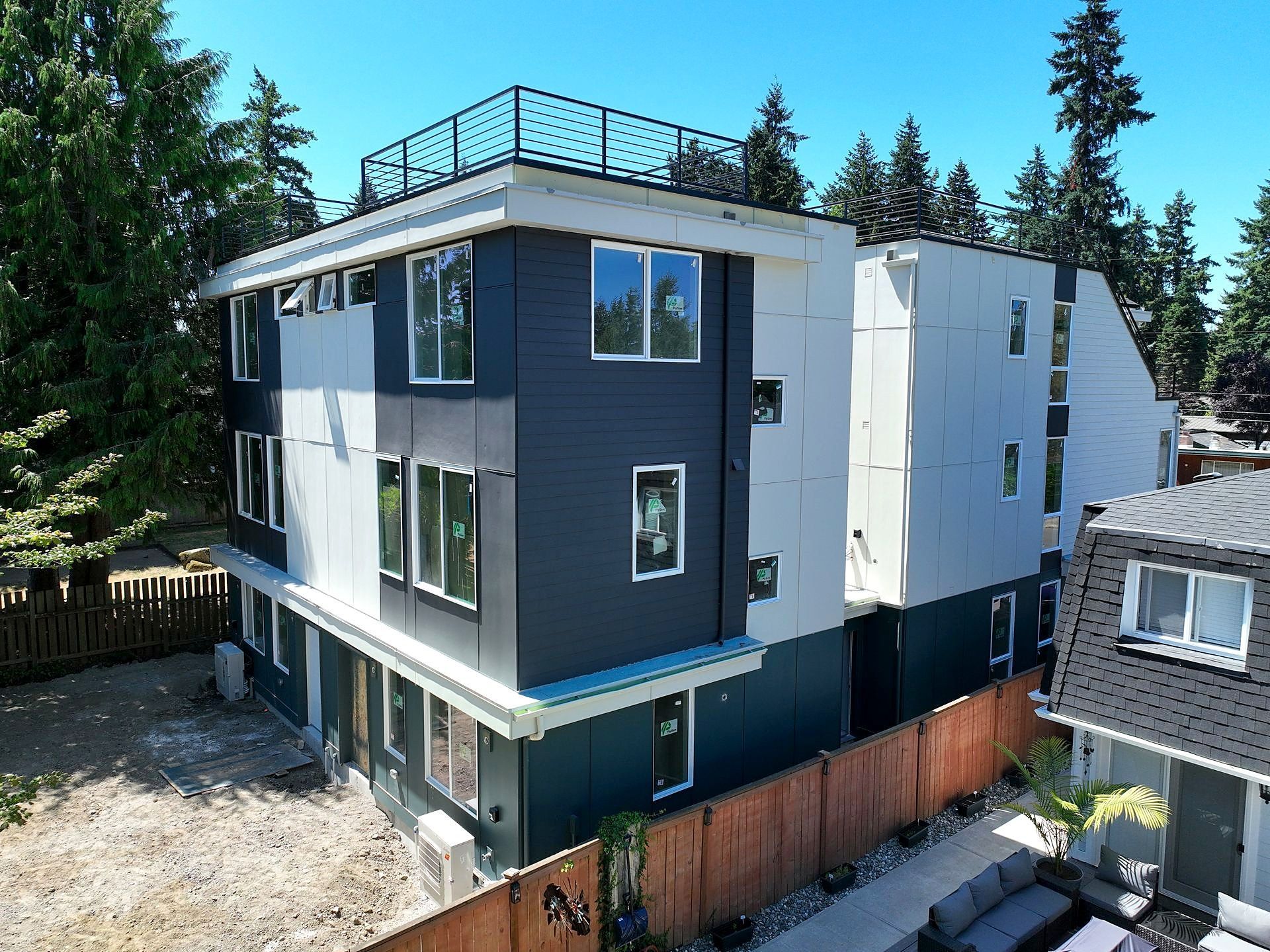 An aerial view of a building with a balcony on top of it