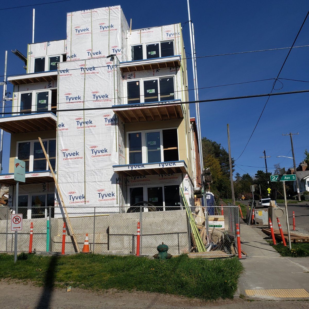 A building under construction with tyvek covering the side
