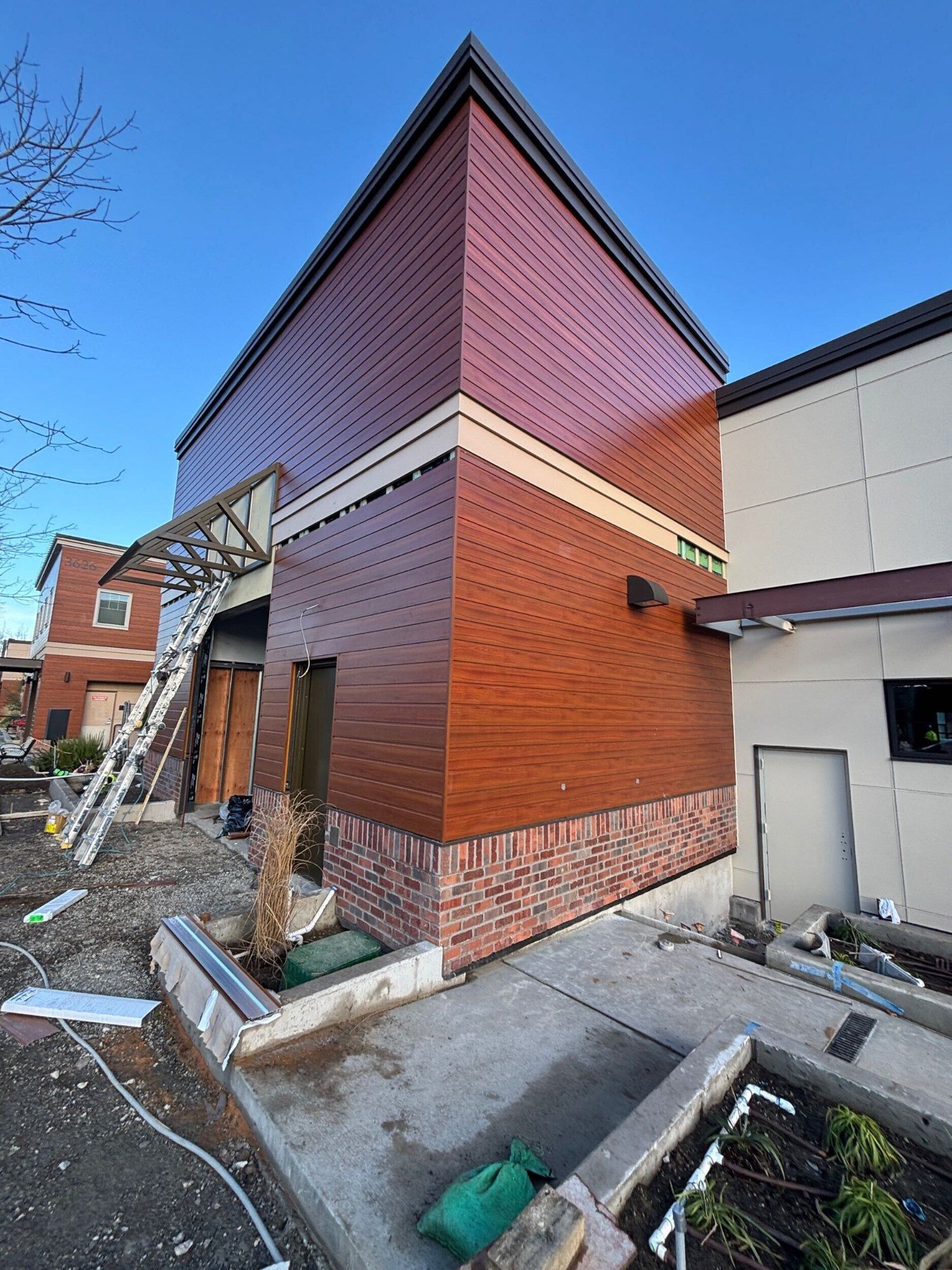 Completed Longboard, fiber cement and Fiberon siding at Chambers Bay Lot 3B in University Place, WA by United Seattle