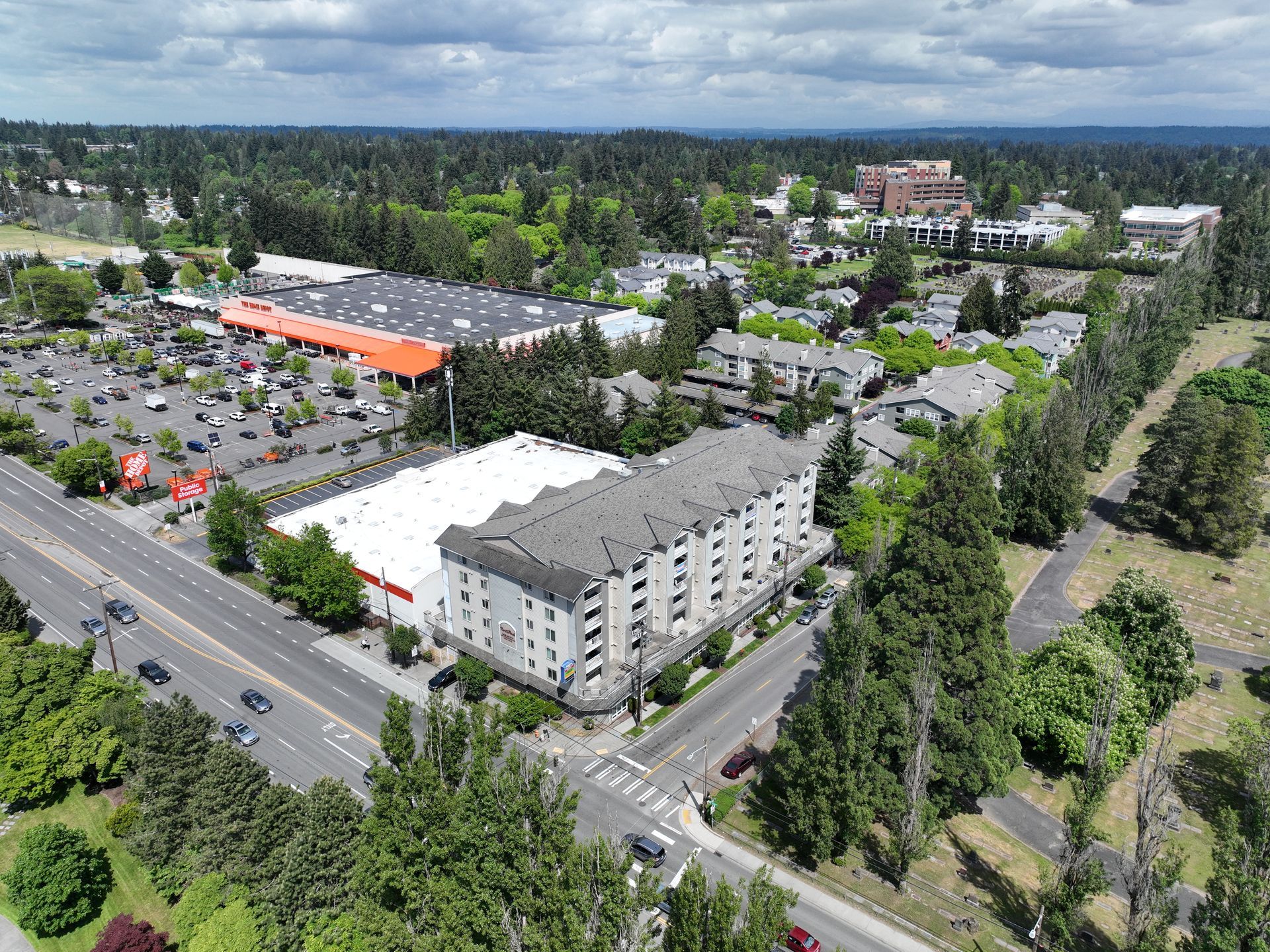 An aerial view of a city with a lot of buildings and trees.