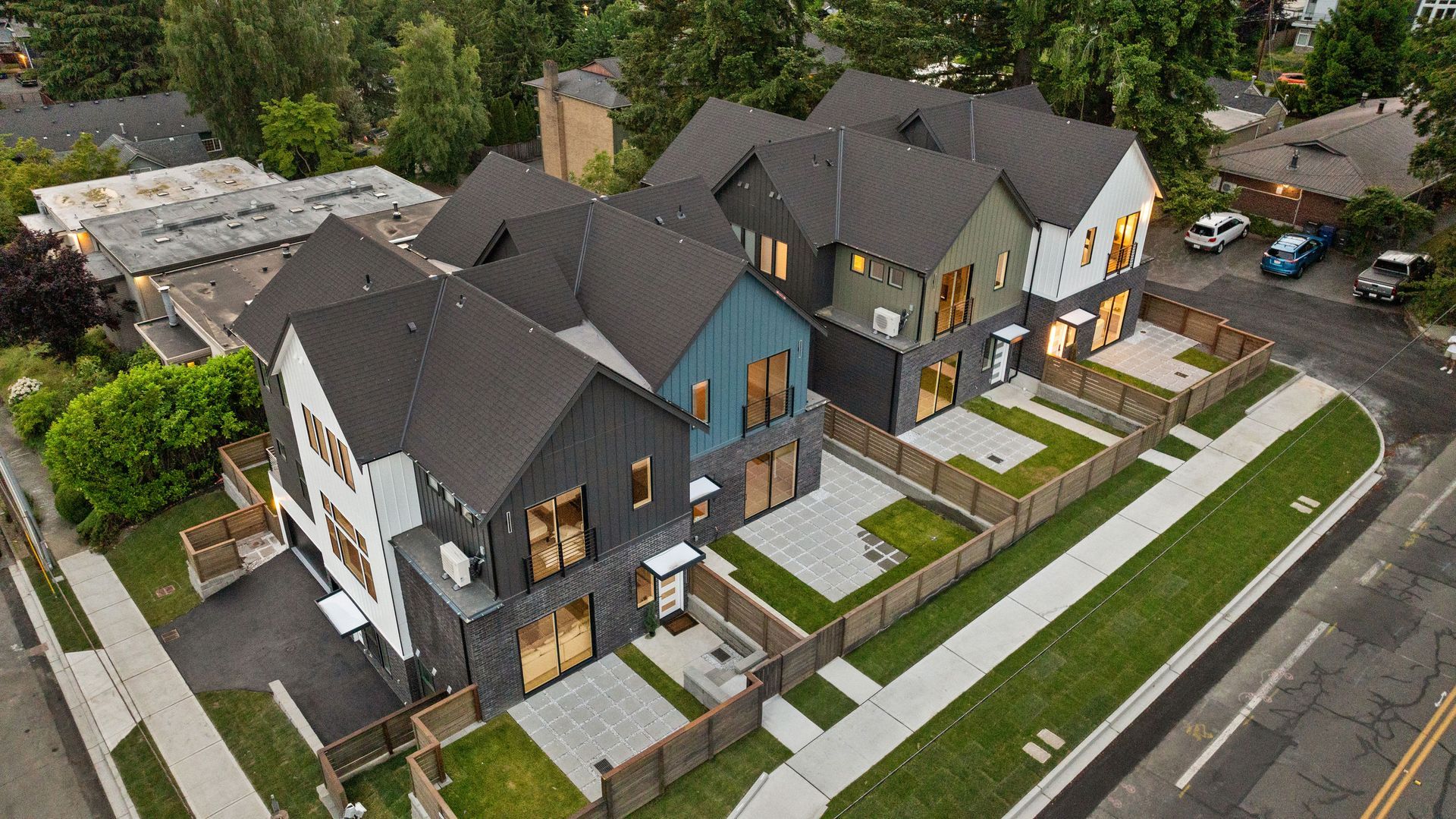 Lumina Townhomes in Bothell, WA, siding, windows, slim brick, drywall and concrete by United Seattle
