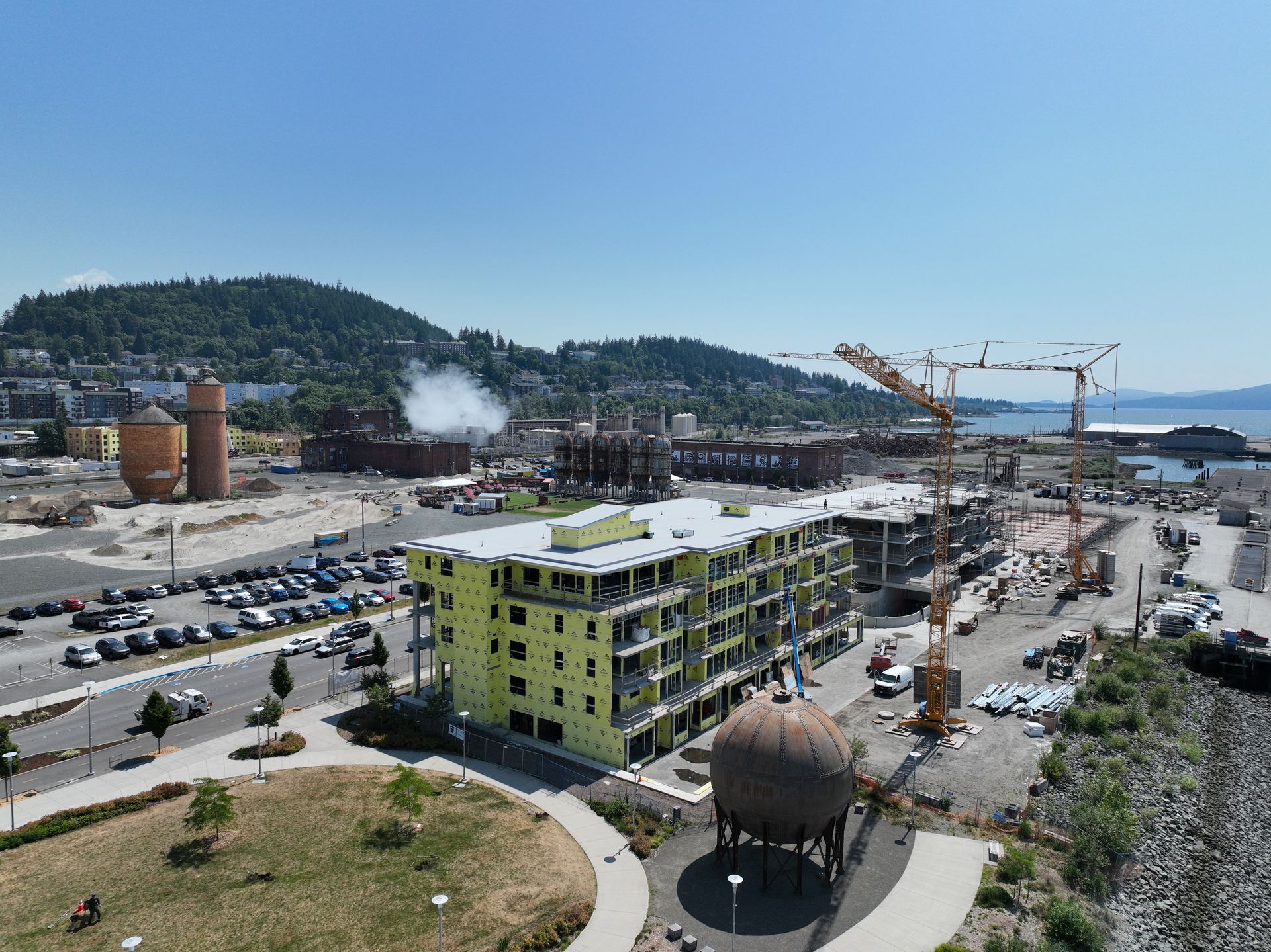 An aerial view of a building under construction in a city
