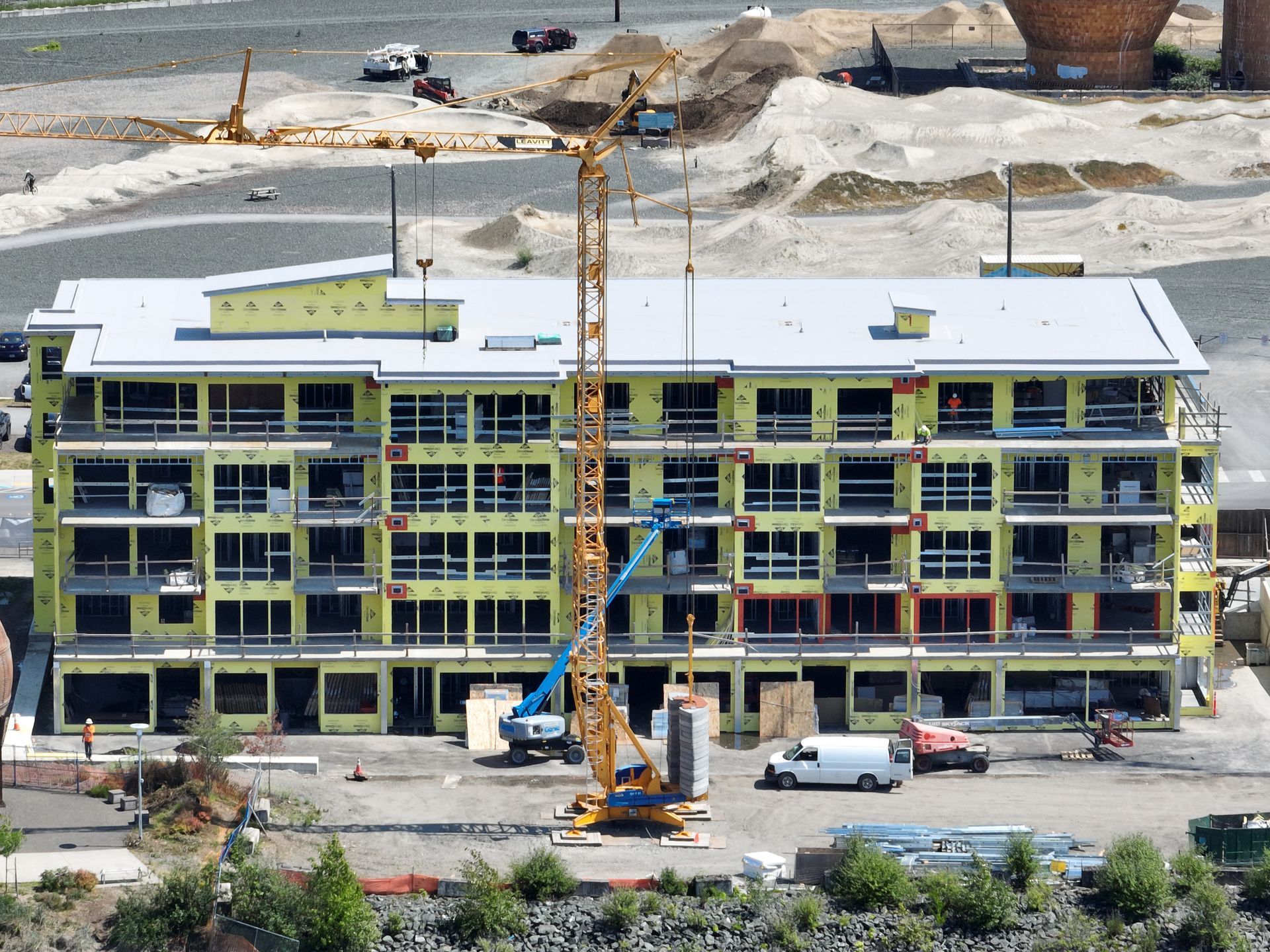 An aerial view of a large building under construction