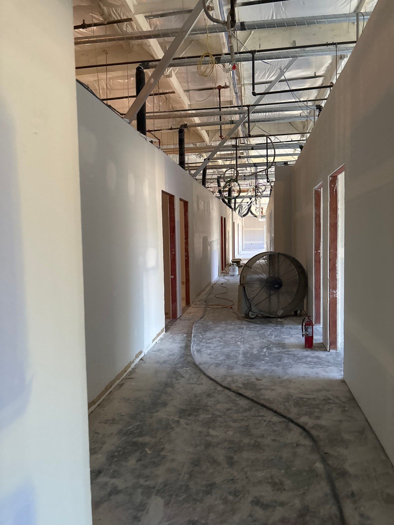 Completed metal & wood framing, drywall at IML Security Supply in Tukwila, WA by United Seattle