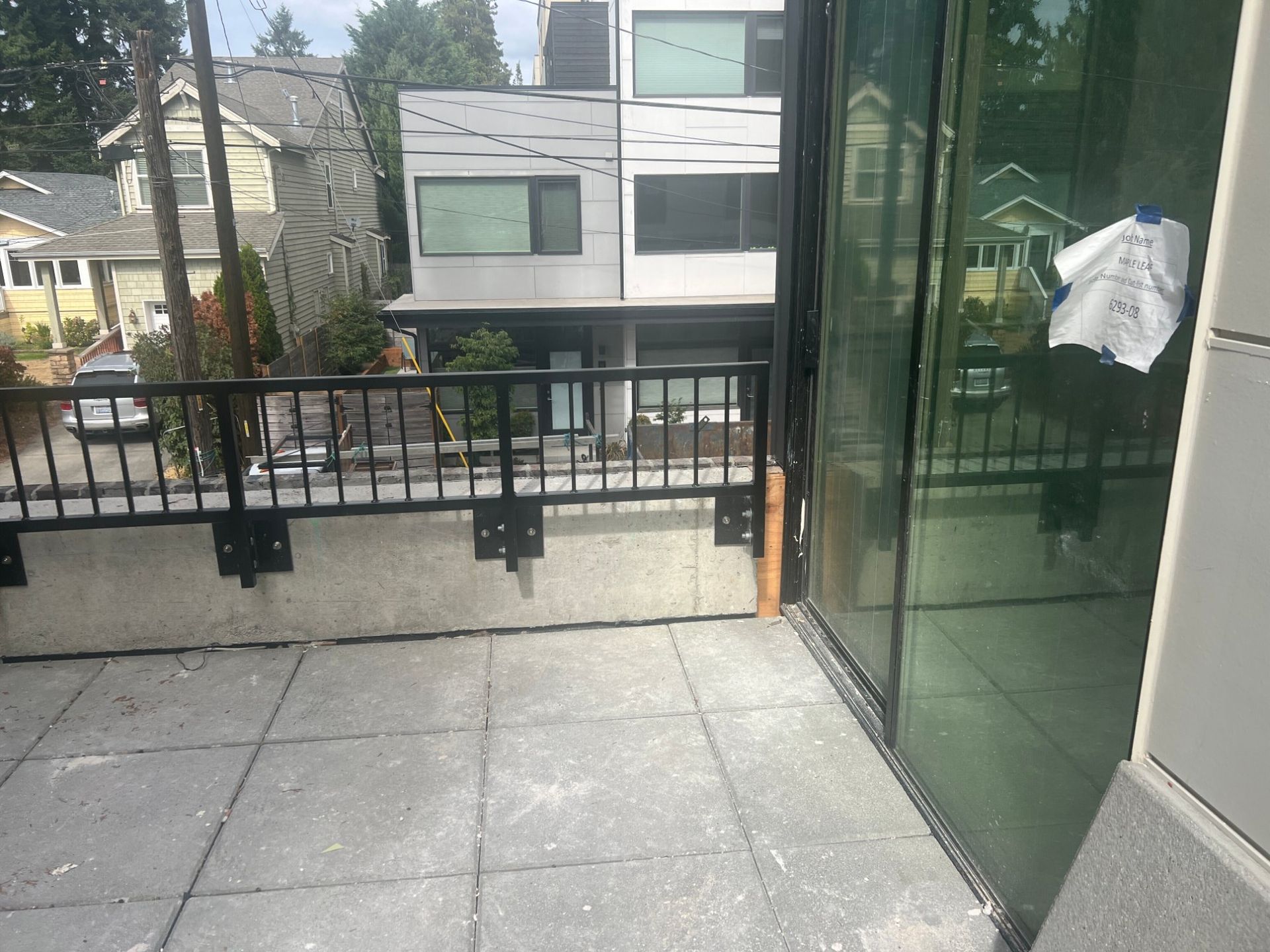 Completed fiber cement siding, coping & flashing at Maple Leaf Apartments in Seattle, WA by United Seattle