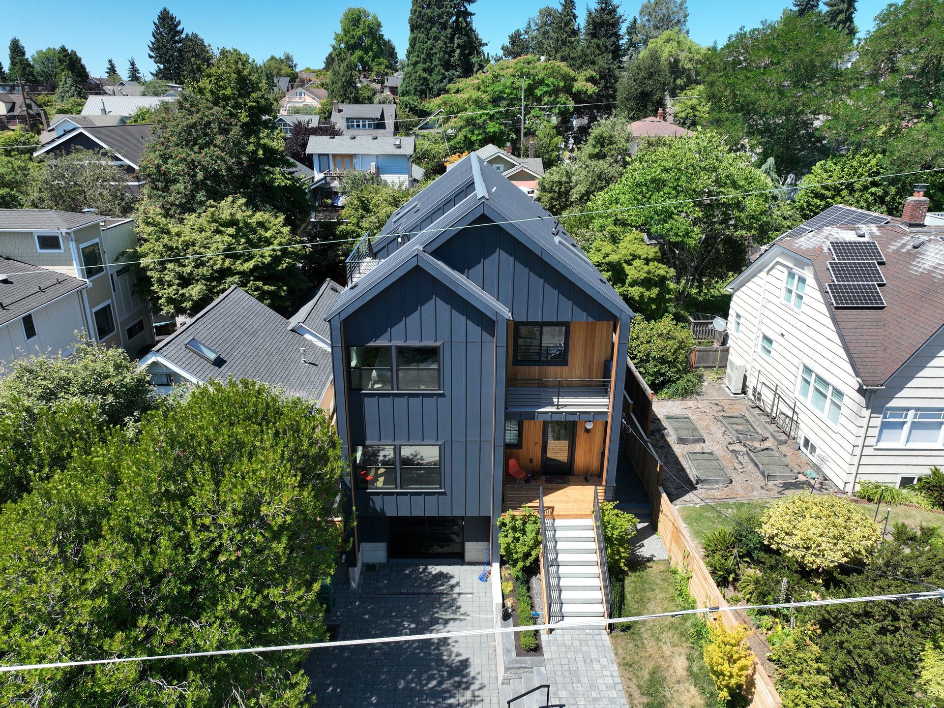 An aerial view of a house in a residential area