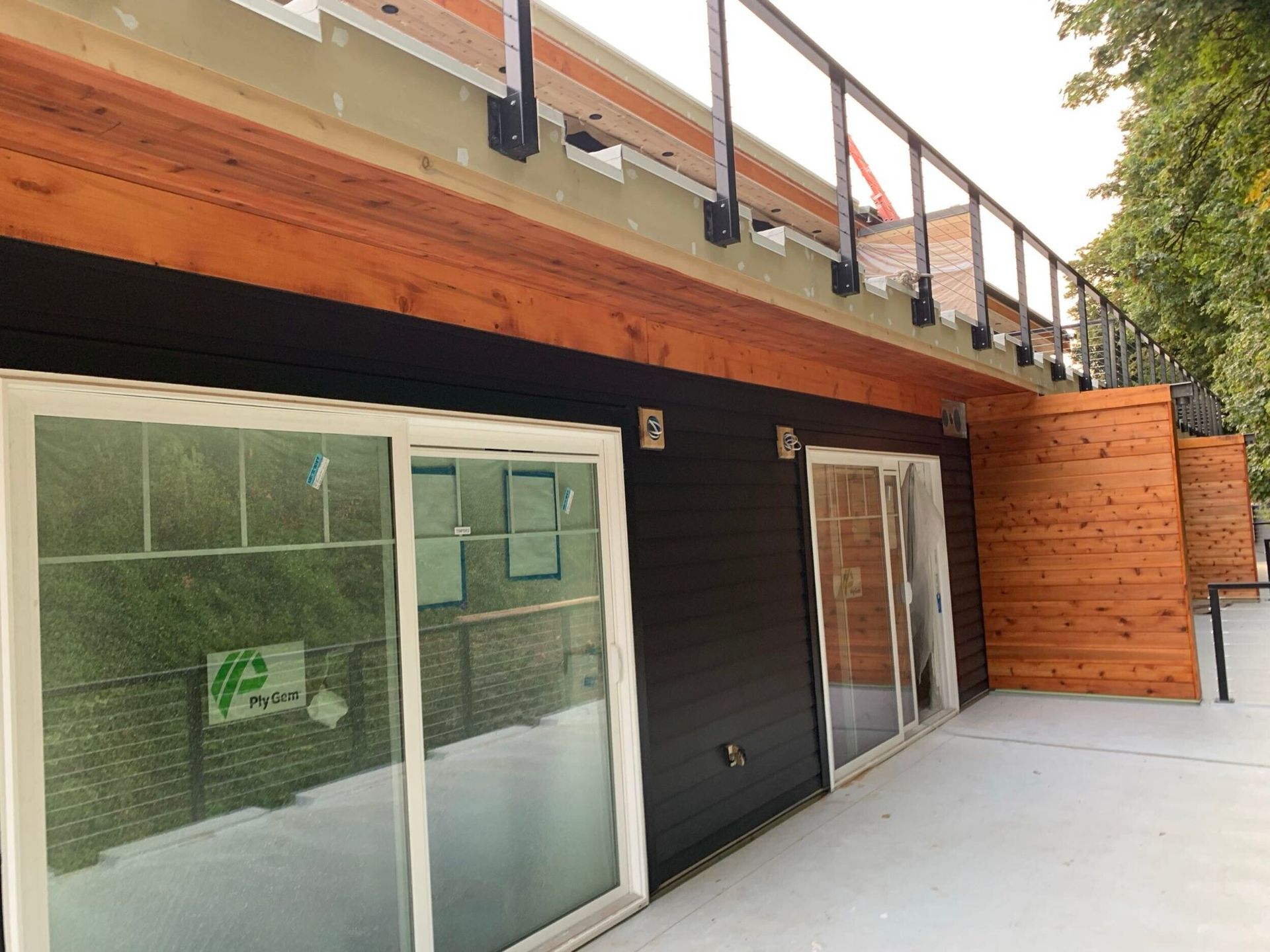 Completed siding, windows, roofing, brick & paint at Riverwalk Apartments in Tukwila, WA by United Seattle