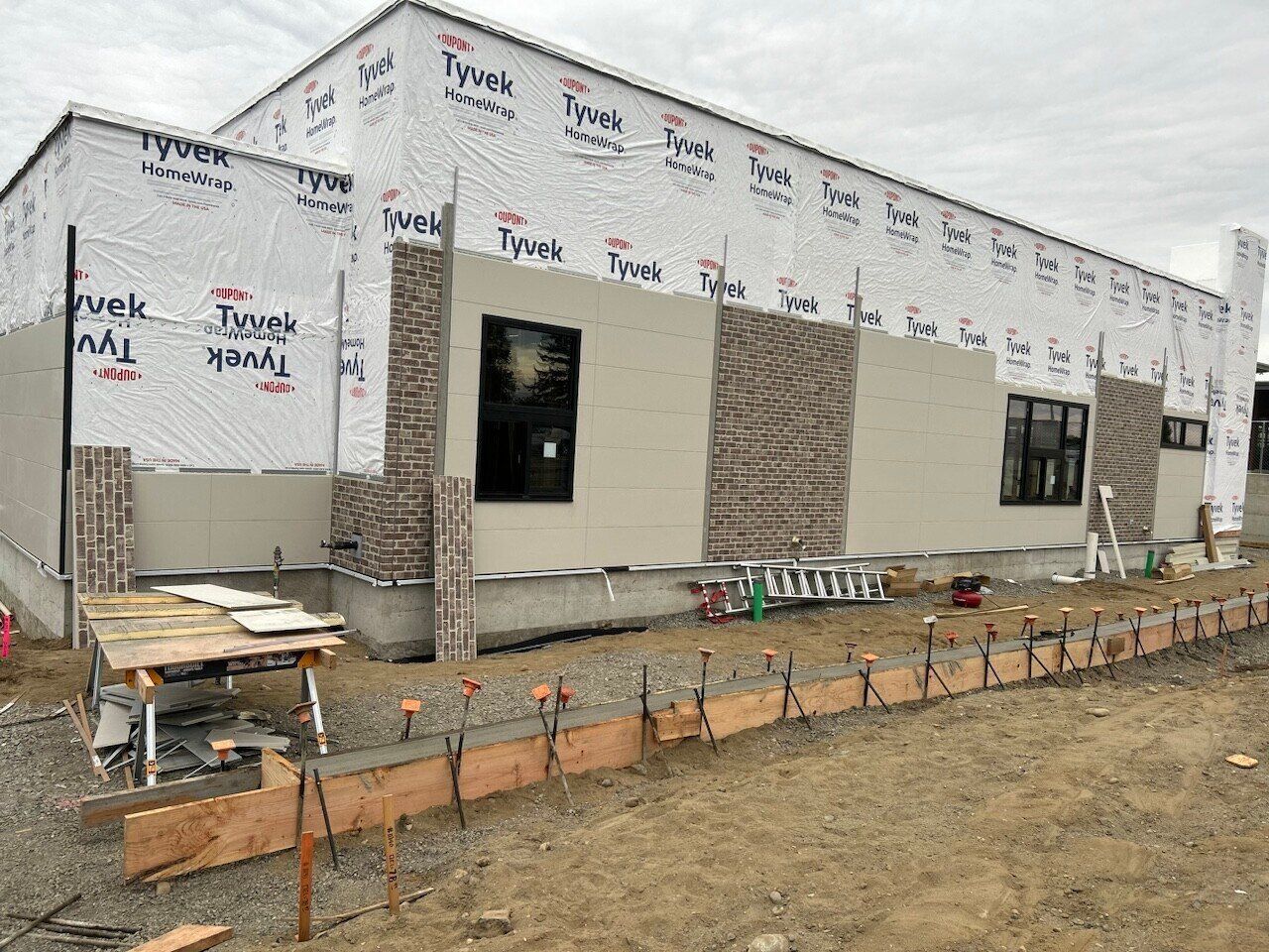 Completed fiber cement siding & insulation at Taco Bell Lynden in Lynden, WA by United Seattle