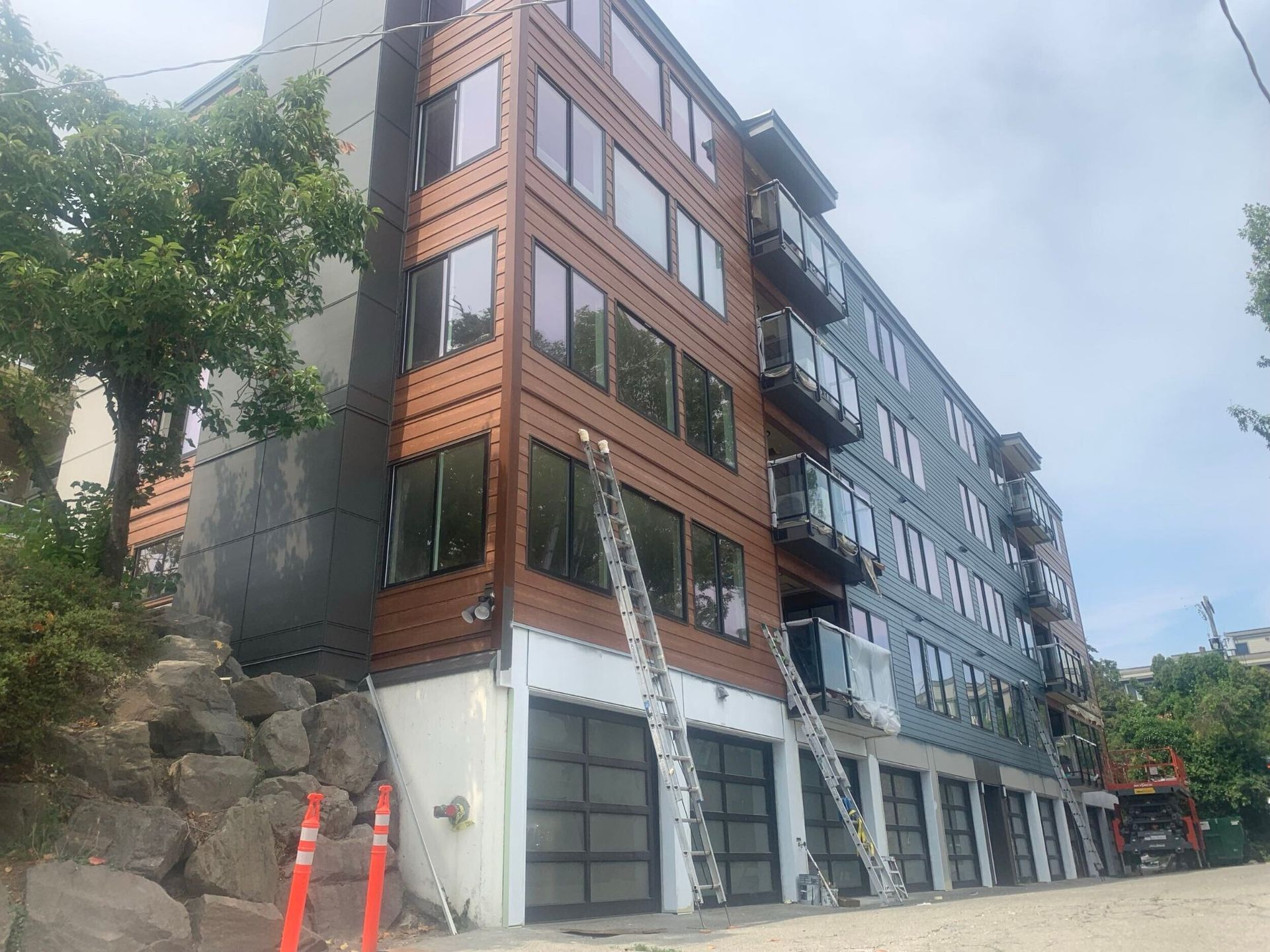 Completed re-side, windows, doors & paint at Galaxie Condominiums in Seattle, WA by United Seattle
