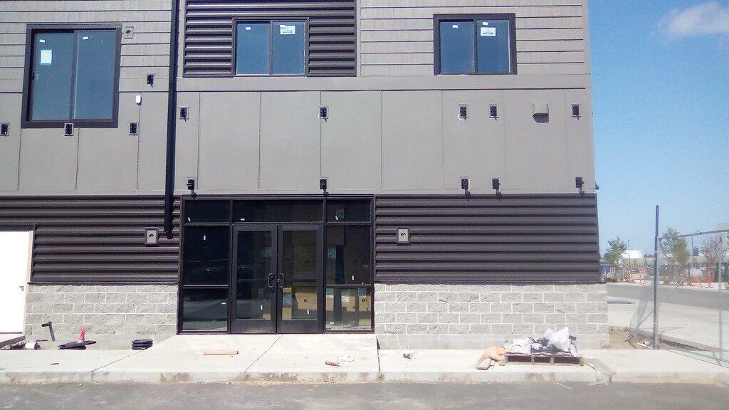 Completed metal siding at The Outpost at Smokey Point in Arlington, WA by United Seattle