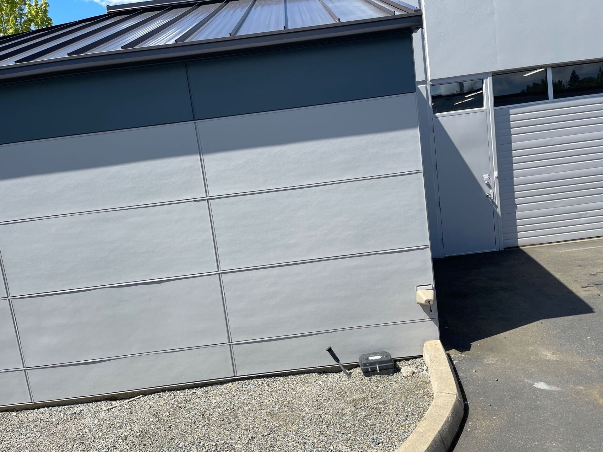 Completed fiber cement re-side, trim & flashing at Totem Valley Business Center in Kirkland, WA by United Seattl