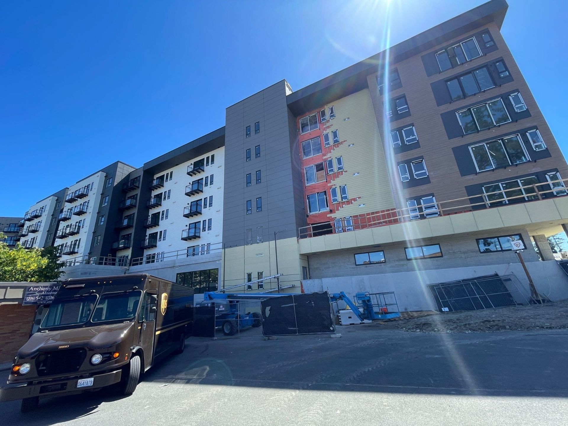 Finished fiber cement and Trespa panel siding at Two10 apartments in Shore