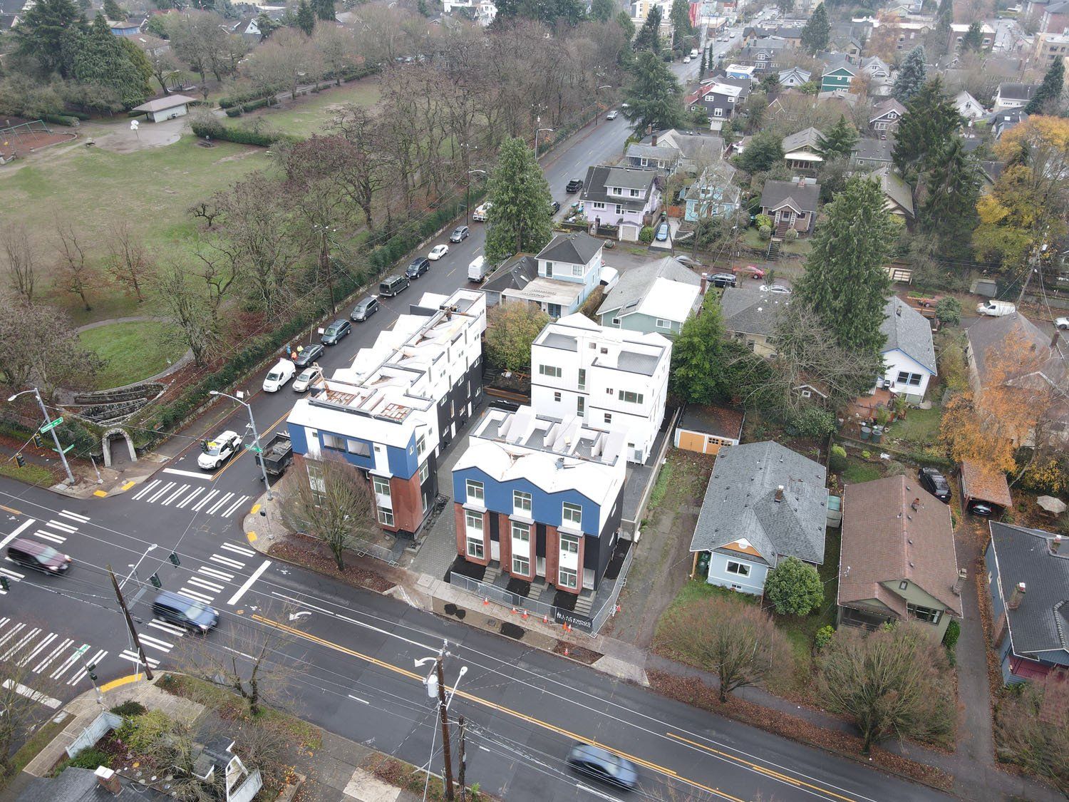 An aerial view of a city with a lot of buildings and trees