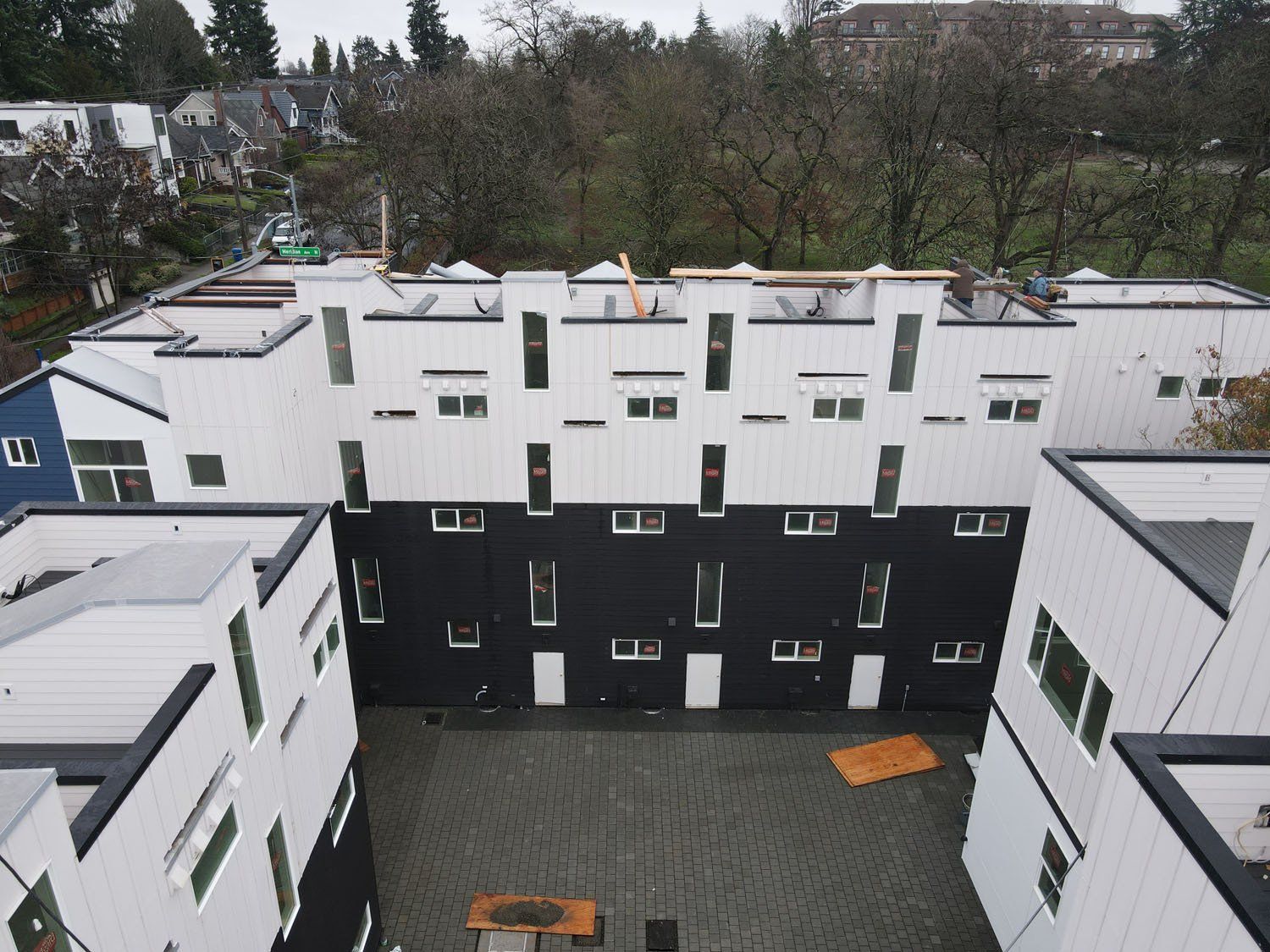 An aerial view of a building with a lot of windows