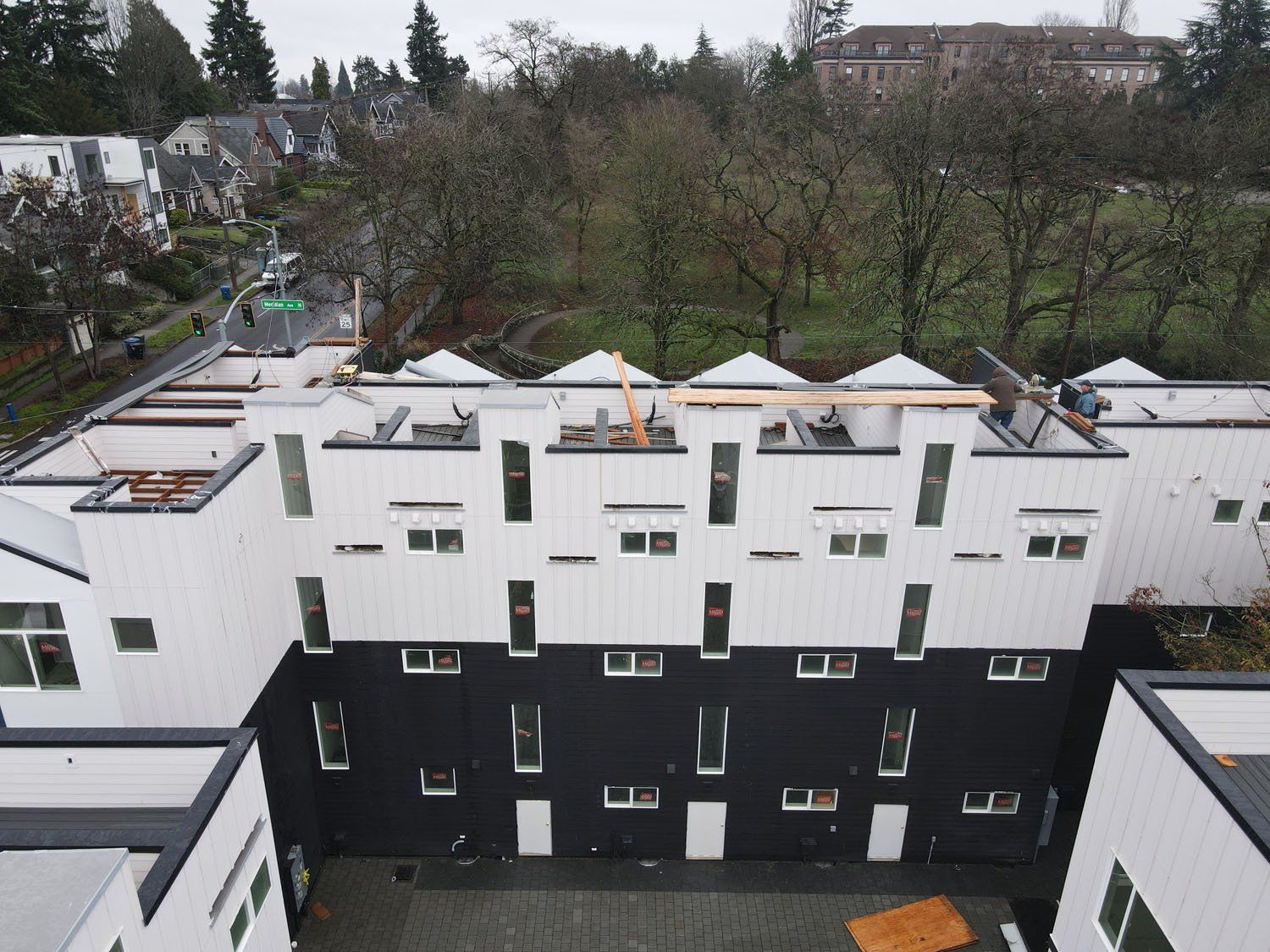An aerial view of a building with a lot of windows