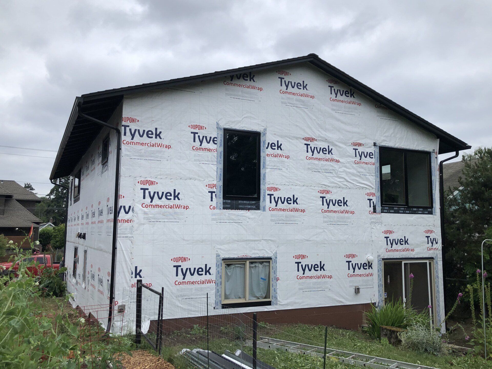 A house with a lot of styrofoam on the side of it.