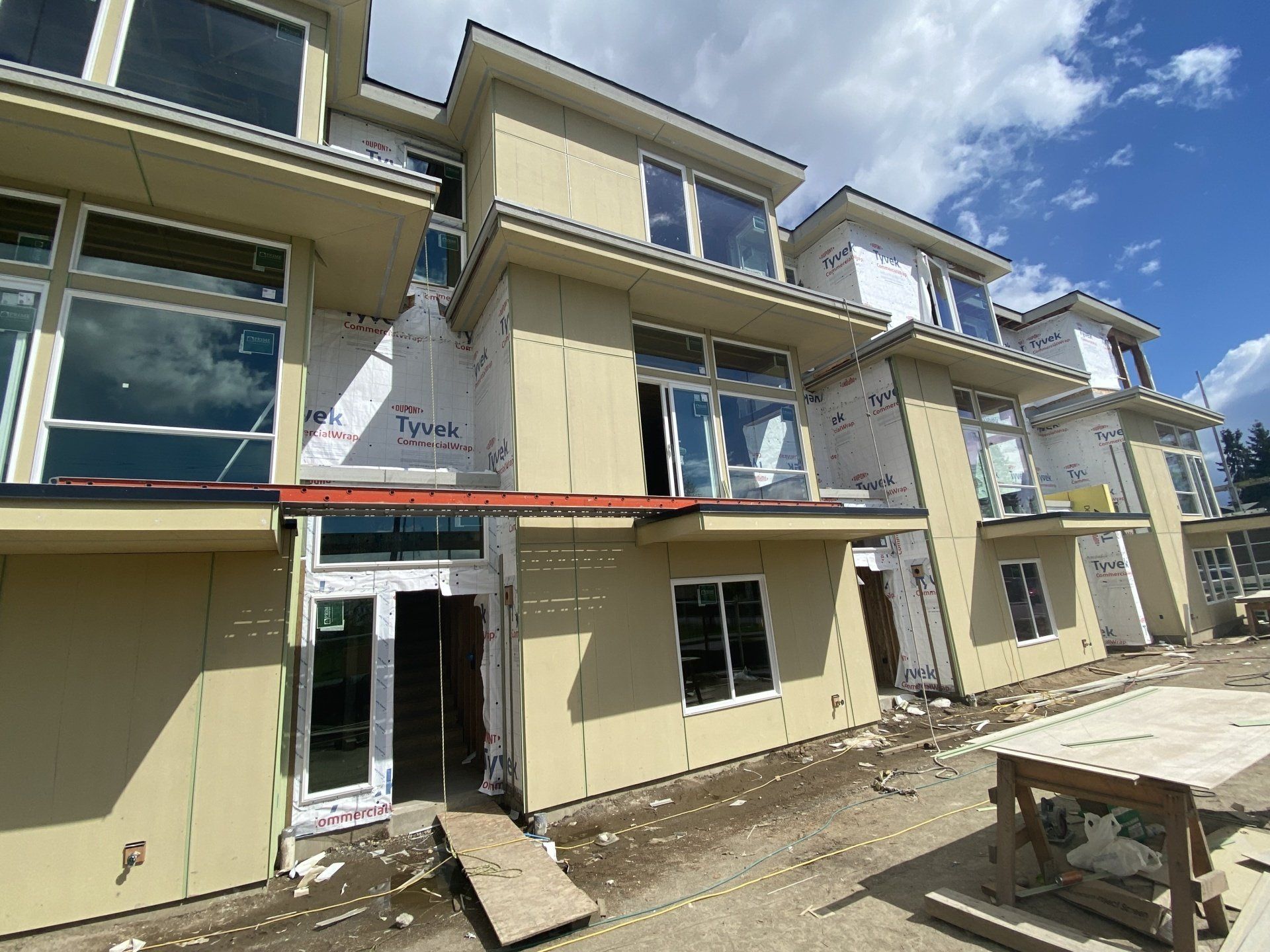 A building with a lot of windows is being built.