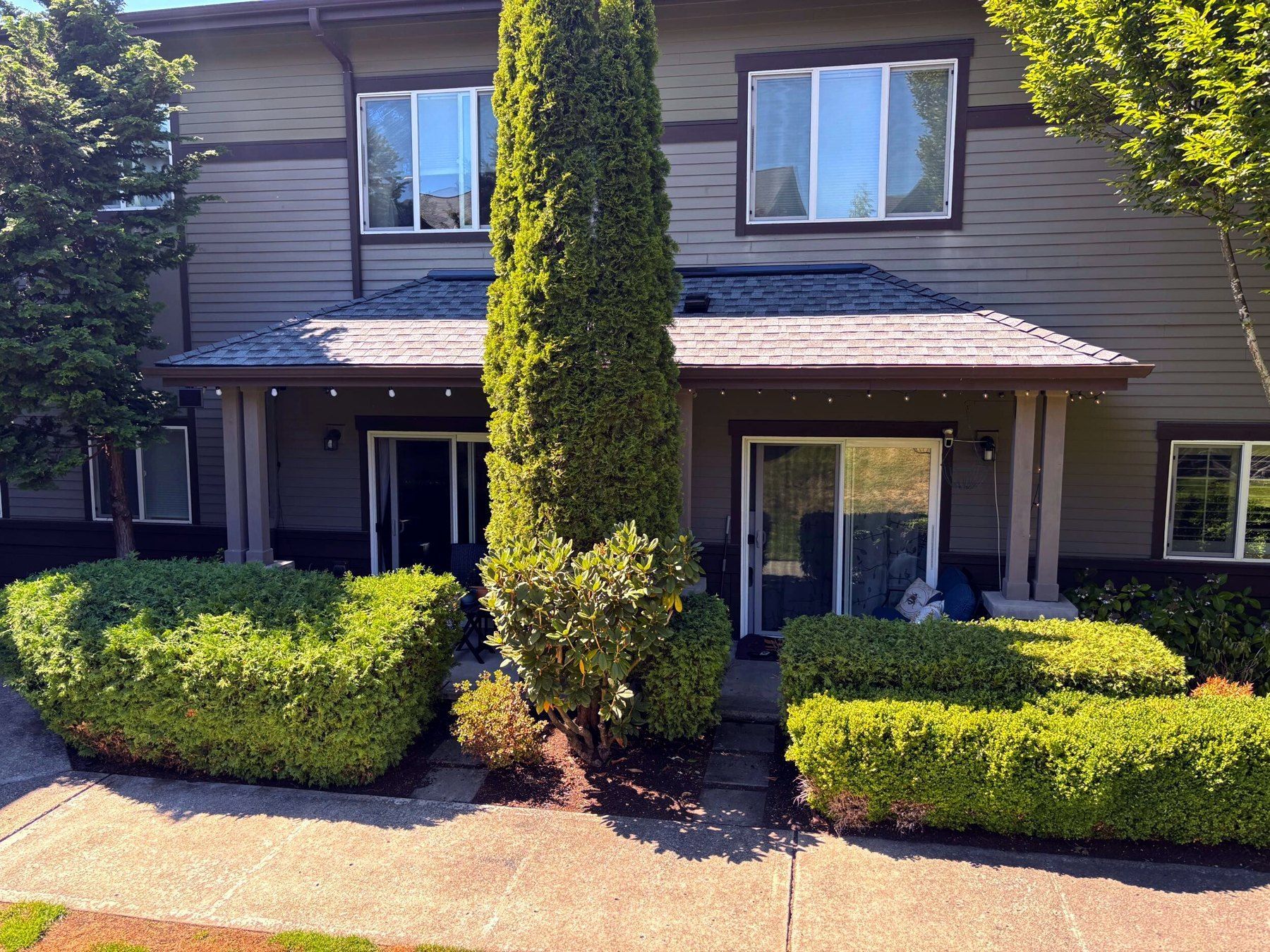 Re-roofed unit entry with new awning roof at Ashford at Vista Park, Issaquah WA