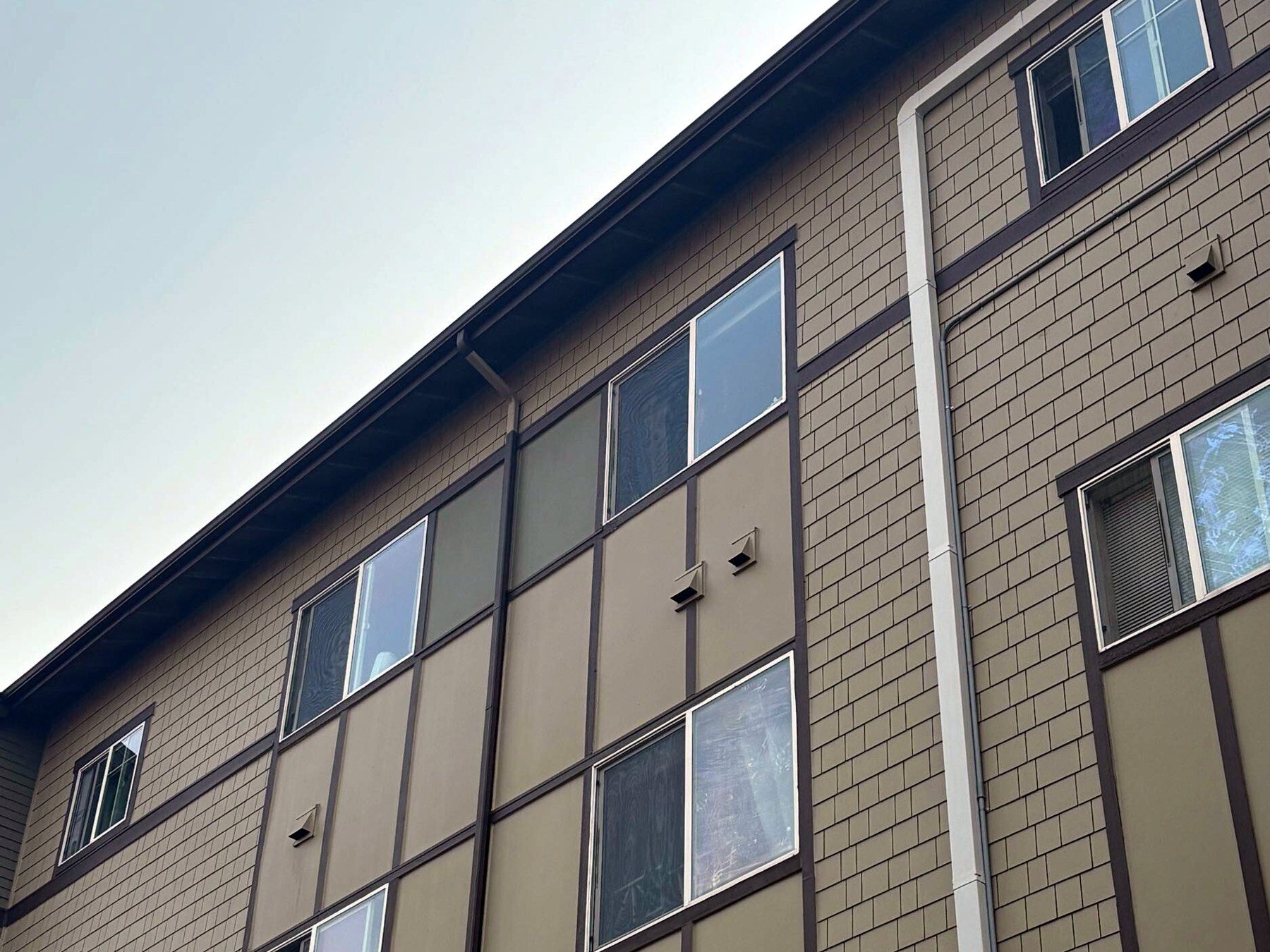 New lap siding and trim on an Ashford at Vista Park condominium building, Issaquah WA