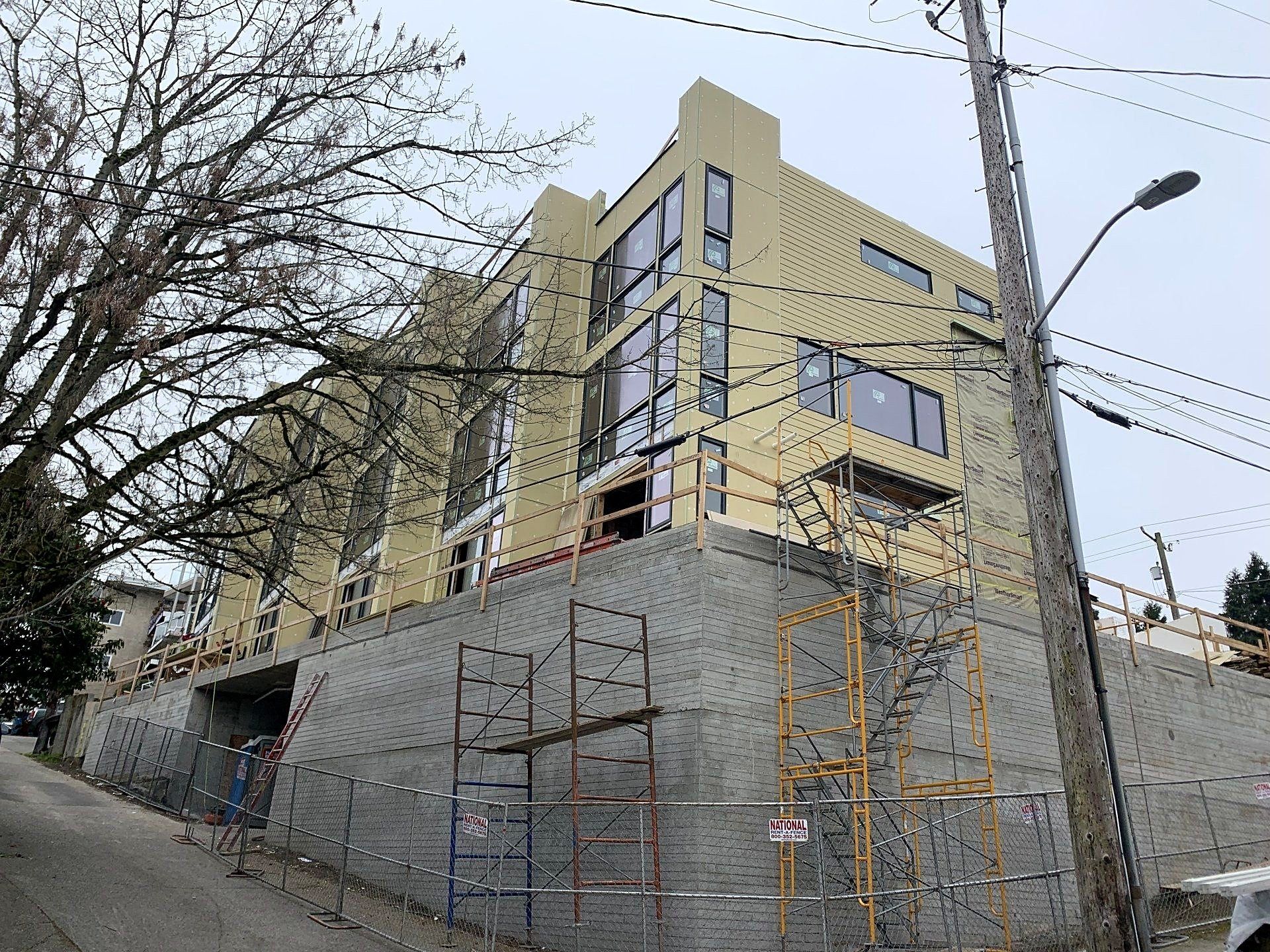 A staircase is being built in a house under construction.
