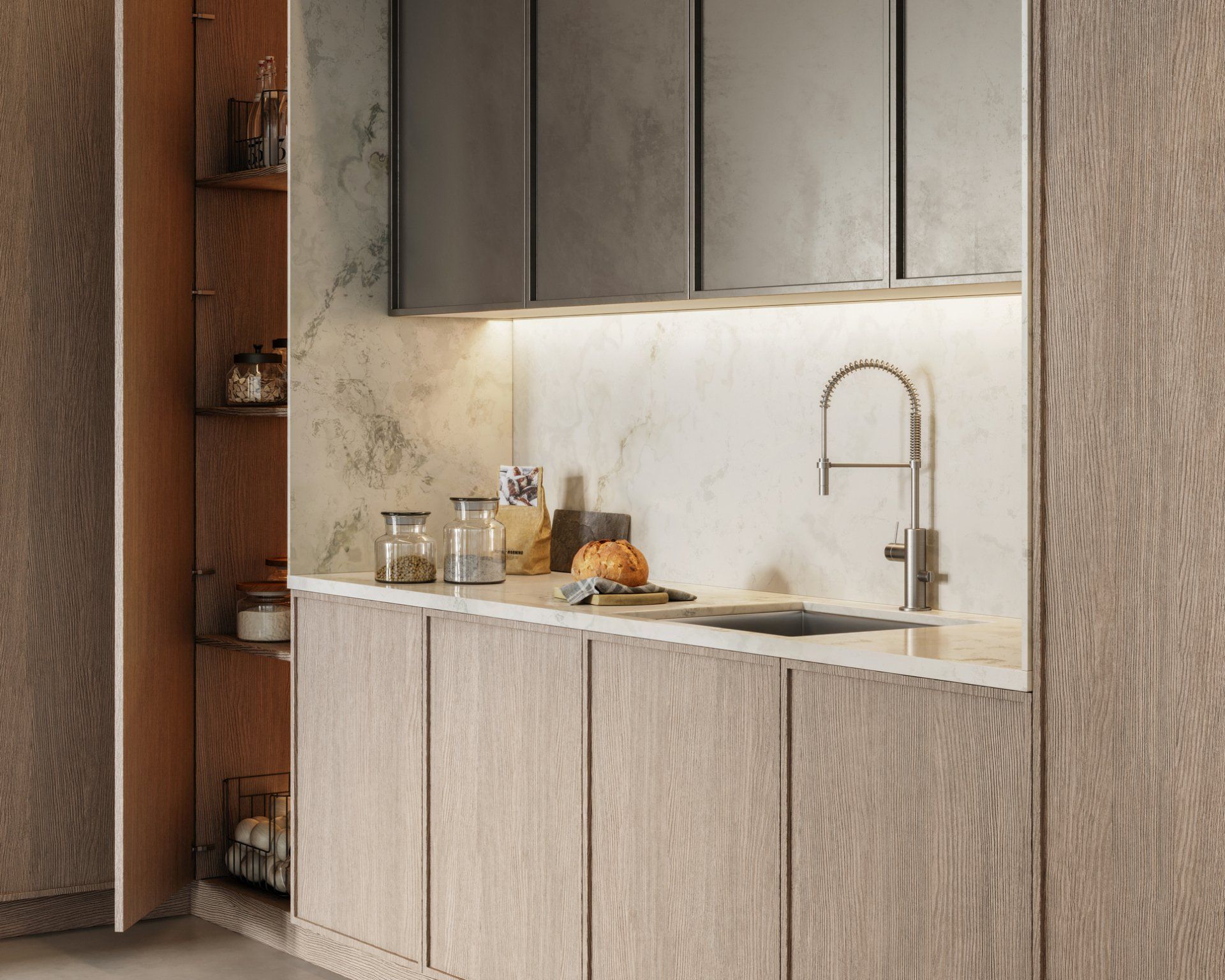 Modern kitchen with light wood cabinets, stone backsplash, sink, and warm under-cabinet lighting