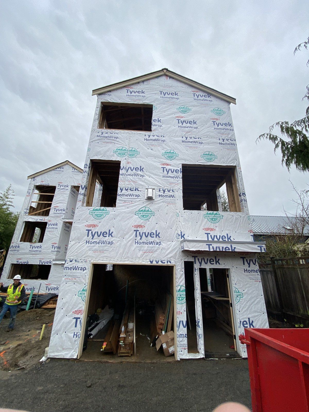 A building is being built with a lot of insulation on it.
