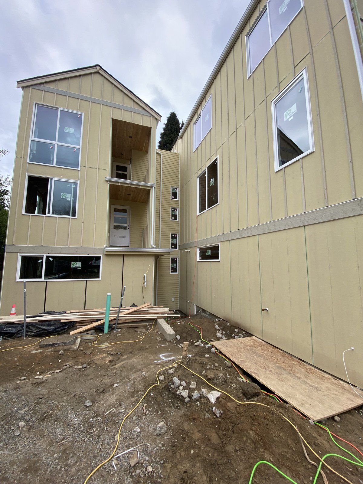 A large building with a lot of windows is being built.