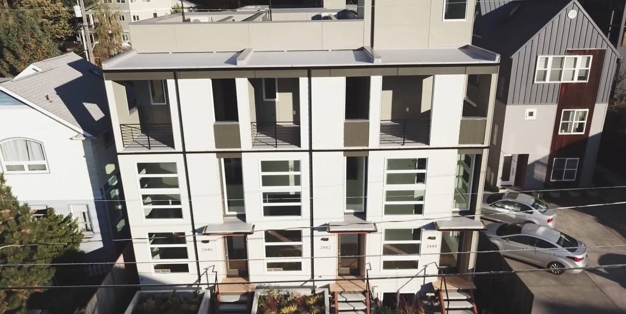 An aerial view of a building with a lot of windows