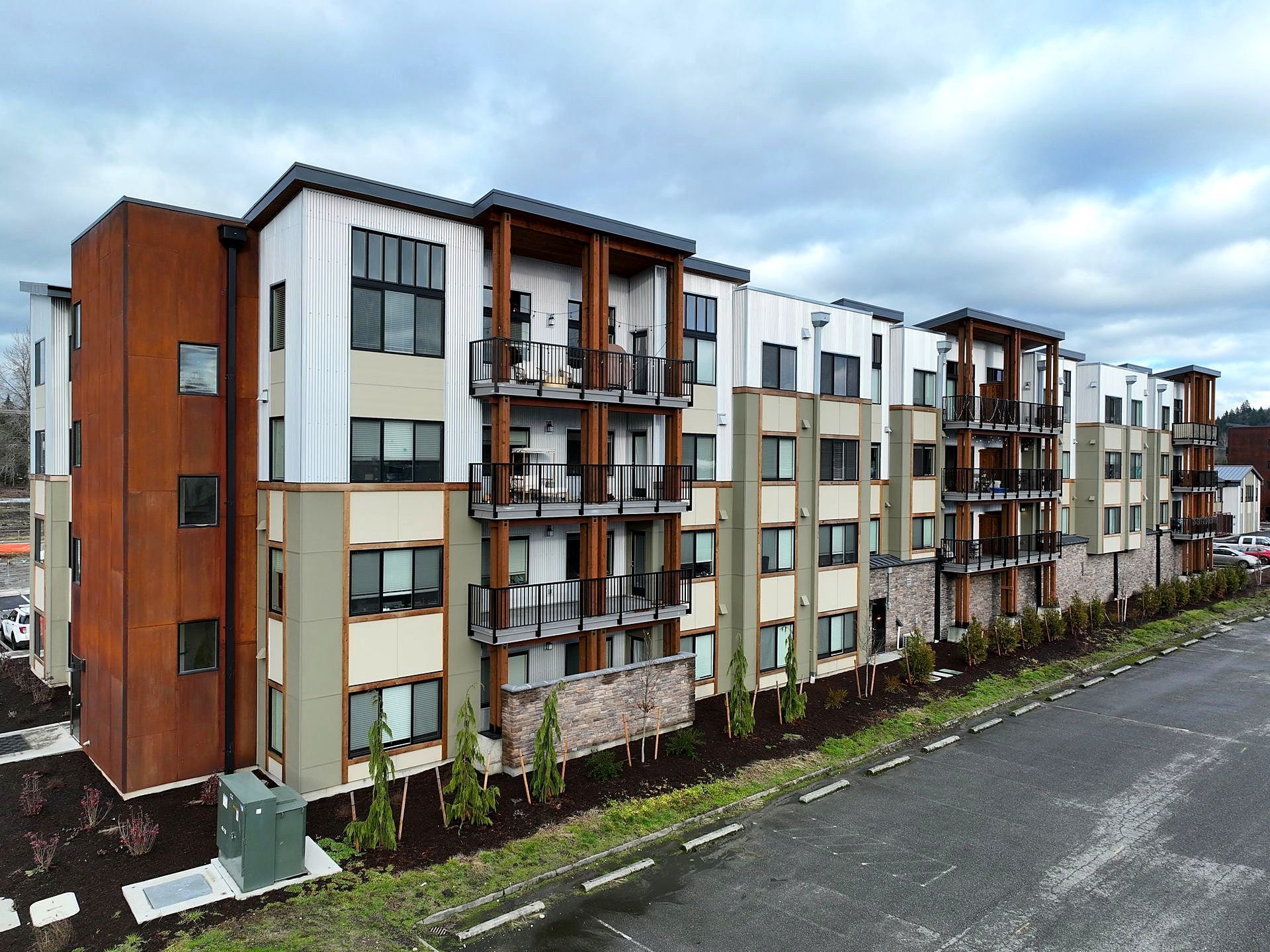 A large apartment building with a lot of windows and balconies