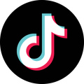 TikTok logo: black circle with a white musical note outlined in cyan and pink
