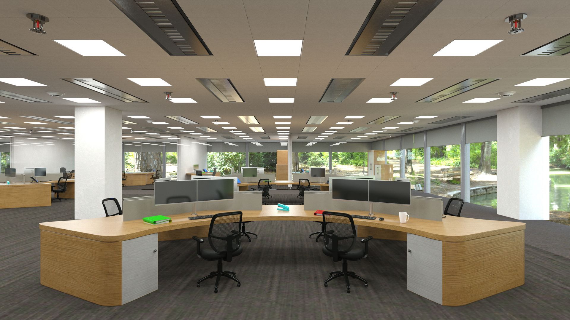 Modern open-plan office with desks, swivel chairs, ceiling lights, and large windows overlooking greenery