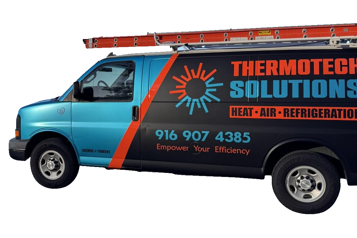 Blue and black Thermotech Solutions van with a ladder on top. Blue and black Thermotech Solutions van with a ladder on top.