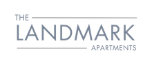 The Landmark Apartments logo in gray on a white background