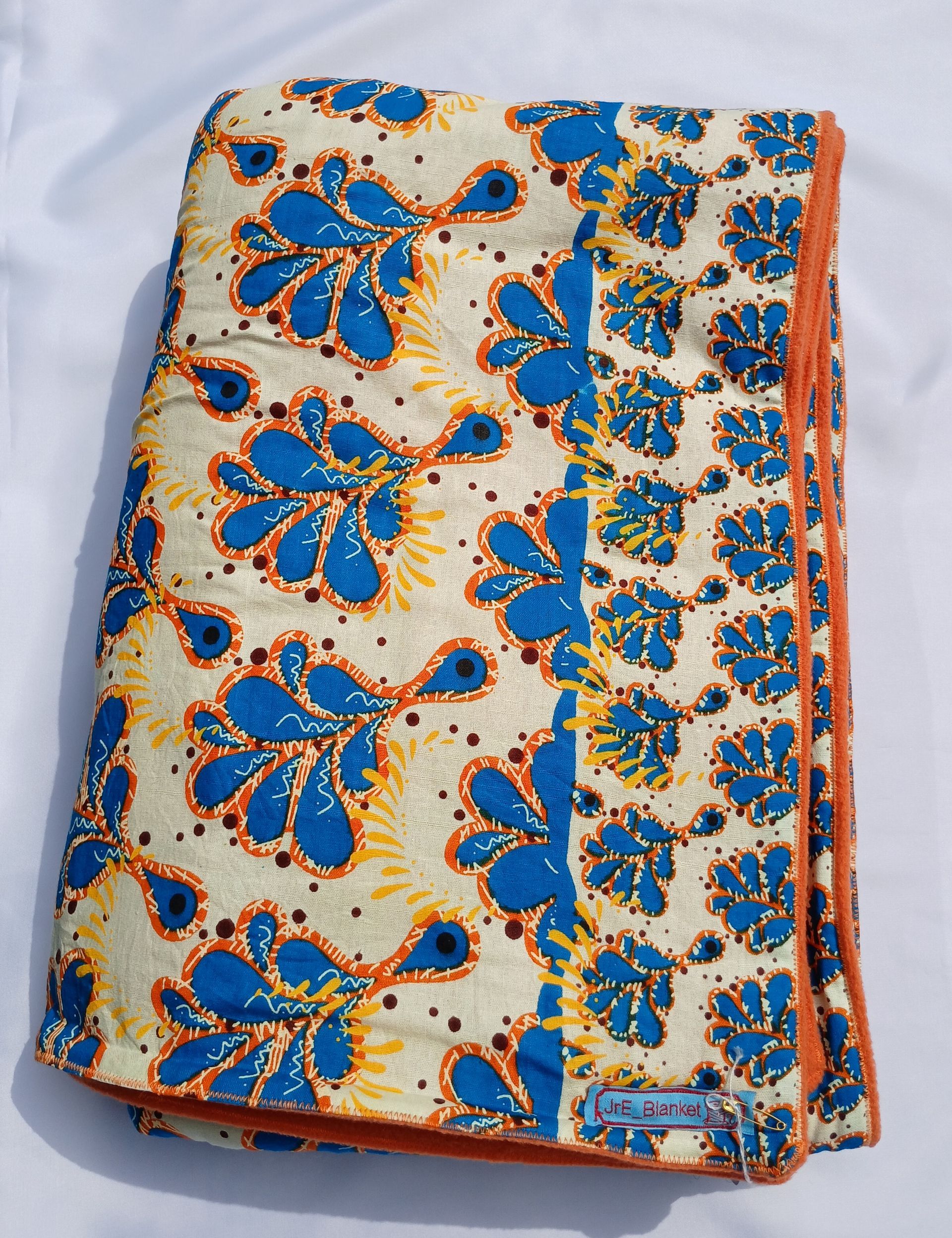 Fleece_OranjeBlauweBloem
