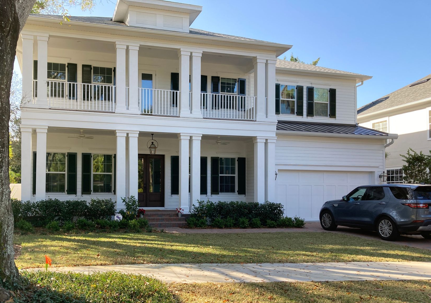 Black colonial shutters on a Florida property