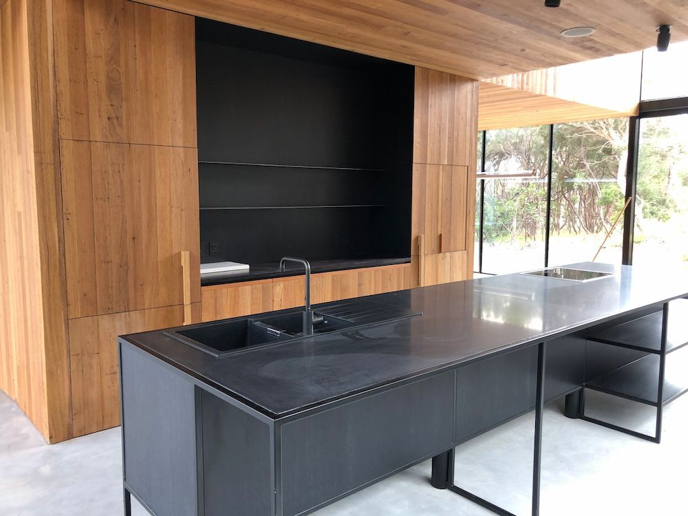 Modern Kitchen With Dark Countertops — On The Rise Builders in Maroochydore, QLD