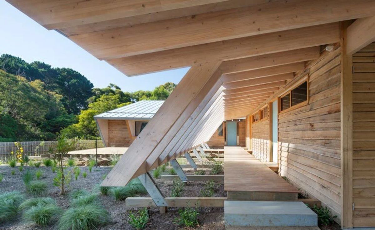 Wooden Building with Sloped, Angled Beams Creating a Shaded Walkway — On The Rise Builders in North Arm, QLD