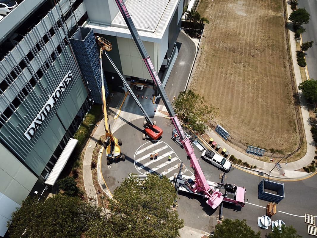 Large Portable Cranes Working on The Outside of A Commercial Building —  D & S Crane Hire & Rigging In Kunda Park, QLD