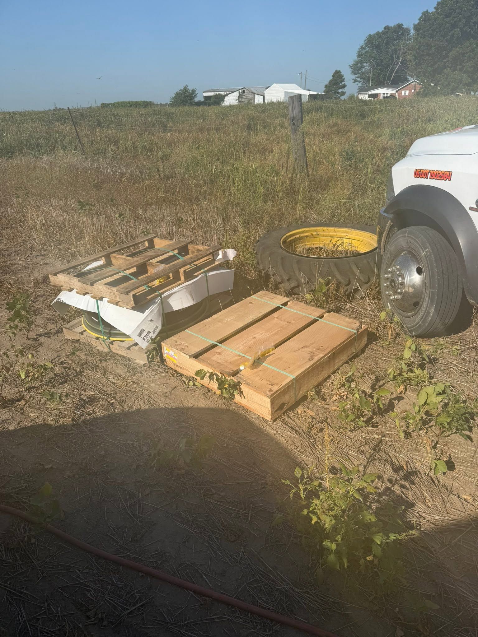 changing tire in field
