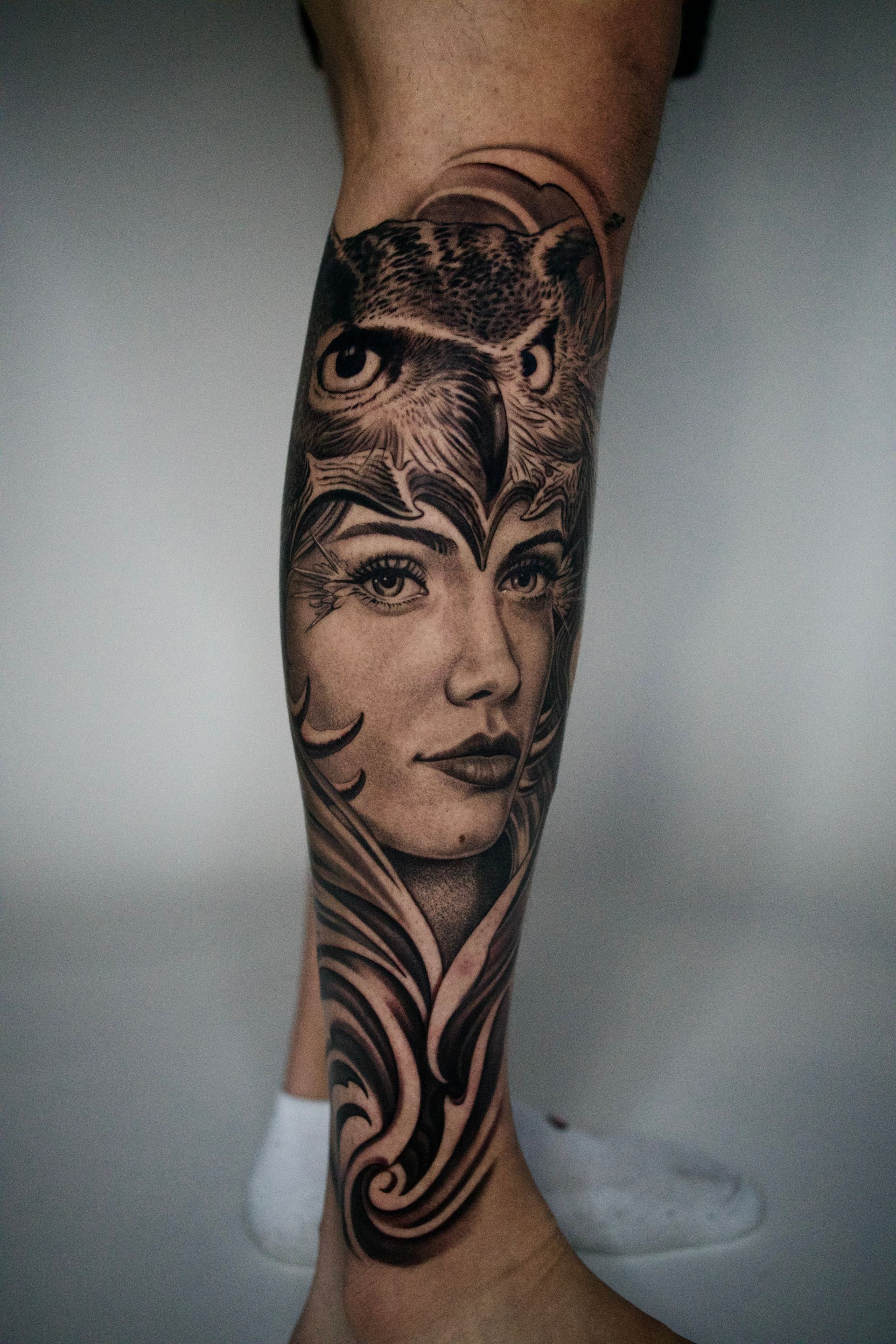 Athena greek Black And Grey Realism owl Tattoo by @ink.artisan