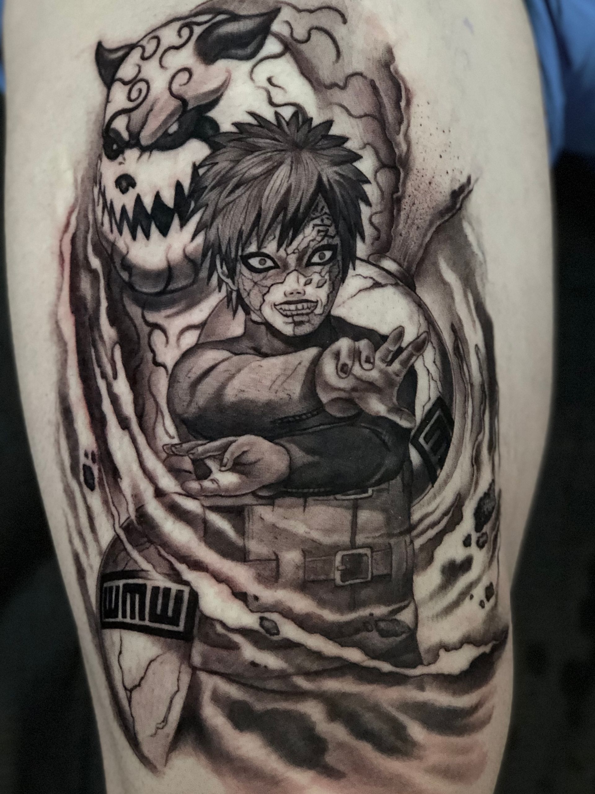 Anime tattoos by Alexis @ink.artisan
Naruto and gara tattoo hidden leaf village in a black and grey design.