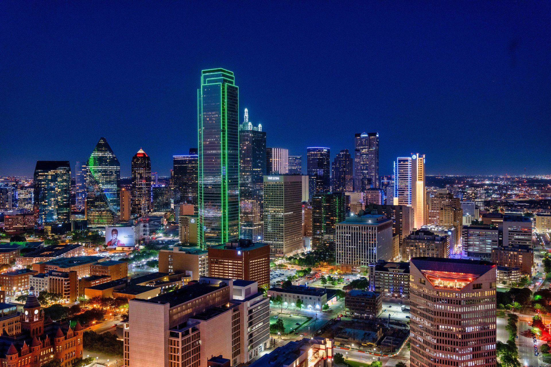 An aerial view of a city skyline at night