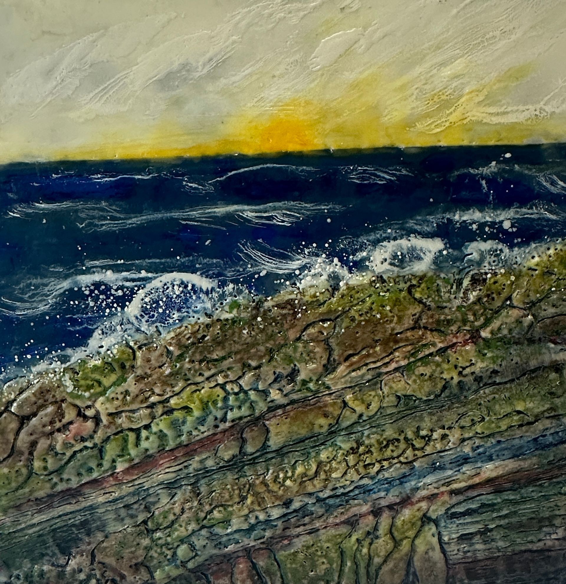A painting of waves crashing against a rocky shoreline