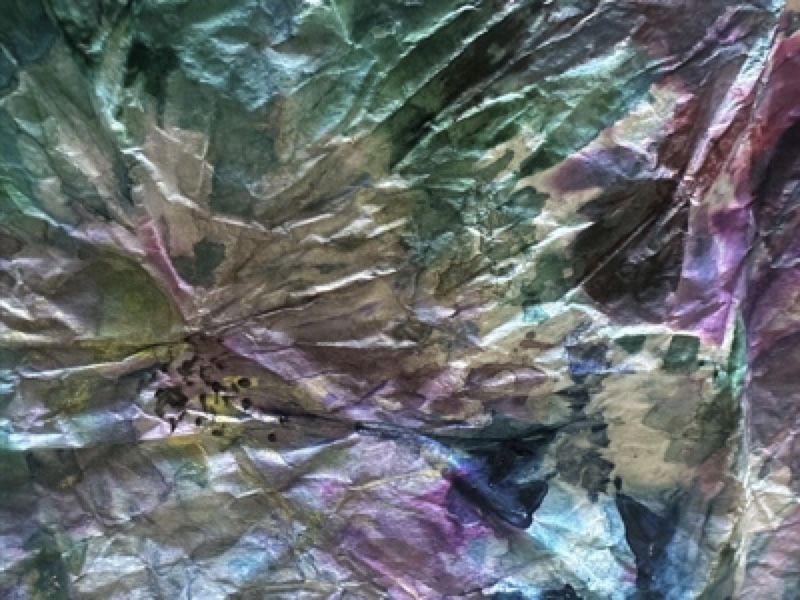 A close up of a piece of colored paper