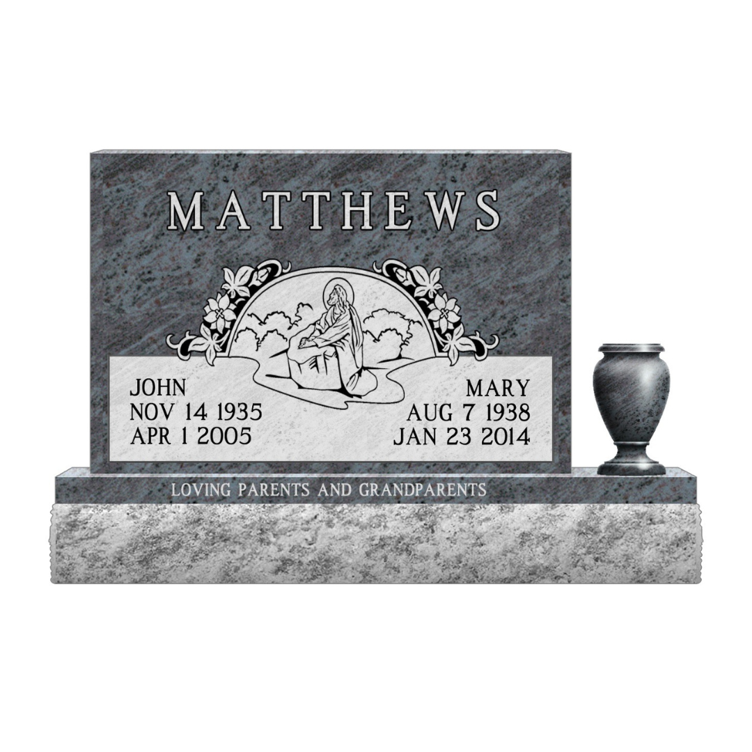 Upright companion monument engraved with a seated Jesus, flowers, and a vase on one side.