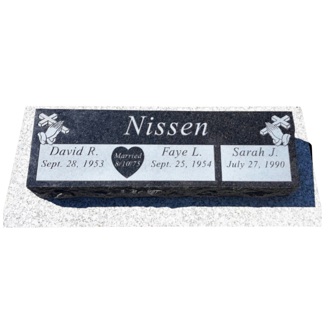 Black granite pillow marker for a couple and their daughter, featuring a heart, crosses and praying hands.