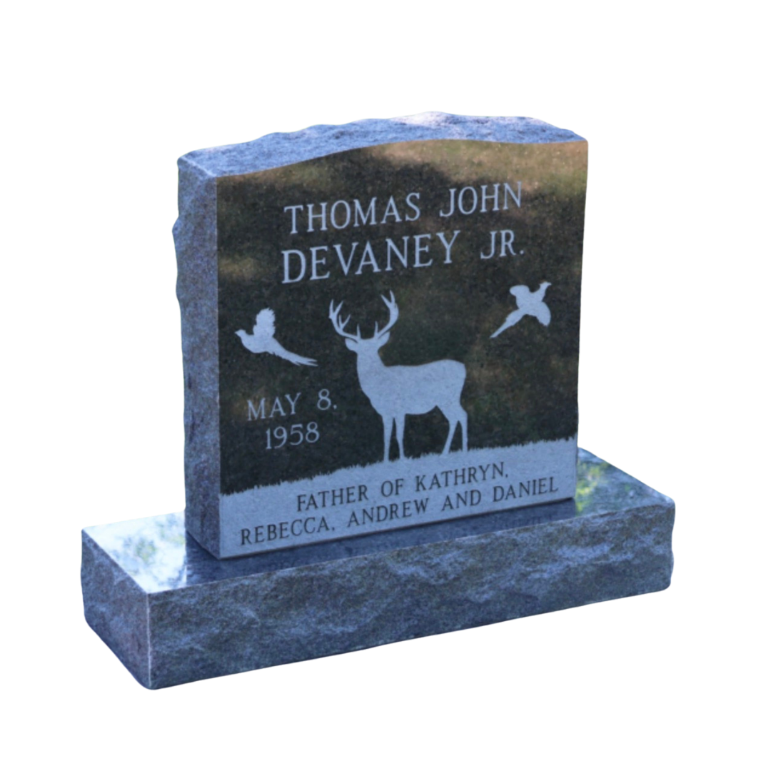 Upright monument engraved with a deer and pheasants.