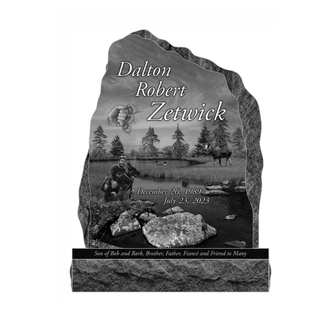 Upright monument with laser engraving of a nature scene, a photo of the decedent, and the small hands of his children.